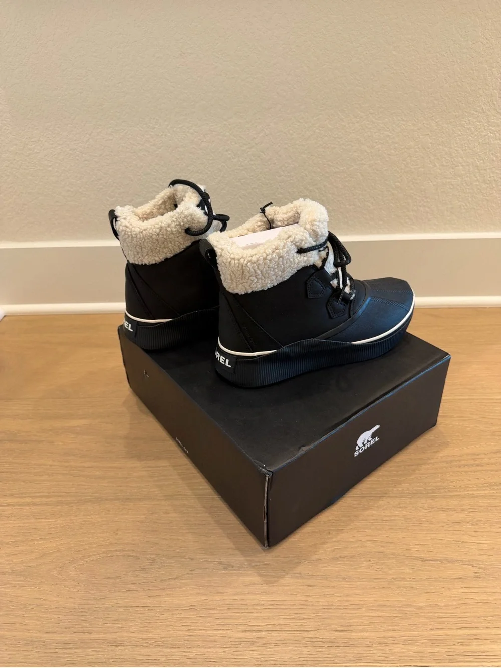 Sorel Black and White Sherpa-Trim Insulated Waterproof Boots